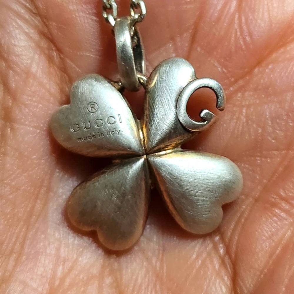 Gucci silver four lead clover necklace and pendant. Dead stock